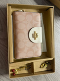 👛 Coach Signature Wallet – Caqui/Café 🤎