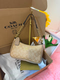 🤍 Coach Signature Shoulder Bag – Elegancia atemporal para cualquier ocasión 🤍