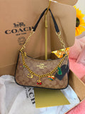 🤎 Coach Shoulder Bag Signature – Elegancia con un toque único 🤎